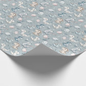 Baby dinosaurussen in het blauw cadeaupapier (Hoek)