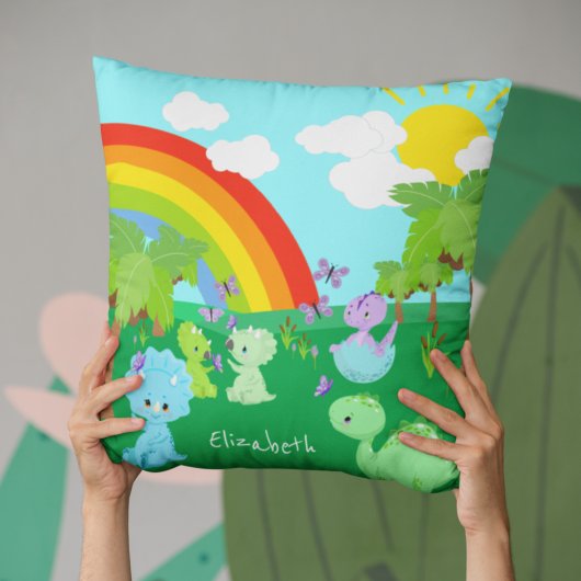 Baby dinosaurussen met buistraten, regenboog en zo kussen