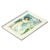 Baby-engel met blauwe bel notitieboek (Linkerzijde)