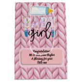 Baby Girl in a Anjer Cradle Januari's Tender Medium Cadeauzakje (Achterkant)