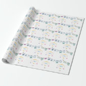Baby hangend speelgoed en baby pyjama inpakpapier (Uitgerold)