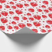 Baby in rode kleur cadeaupapier (Hoek)