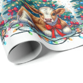 Baby kalf leggen door kerstboom cadeaupapier (Rol Hoek)