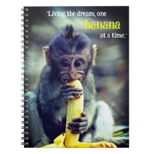 Baby Monkey eet banaan Notitieboek