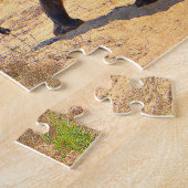 Baby olifant volgt zijn moeder in Zuid-Afrika Legpuzzel (Zijkant)