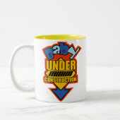 Baby onder Mok voor de bouw (Links)