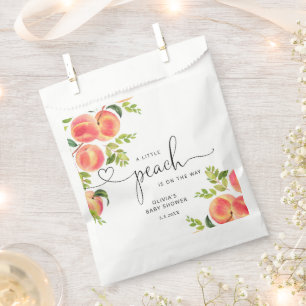 Baby shower van zoete kleine perziken bedankzakje