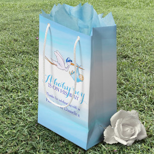 Baby shower verhalenleverder, baby bord klein cadeauzakje