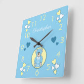 Baby teddy heeft blauw met liefdesharten en een na vierkante klok (Hoek)