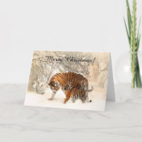 Baby tijger en tijgermoeder in een besneeuwd bos