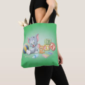 Baby Tom en Jerry die met speelgoed spelen Tote Bag (Dichtbij)