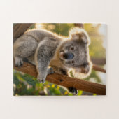 Babykoalaa die zich aan een boom vasthoudt legpuzzel (Horizontaal)