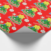 Baby's eerste kerstcadeautje met glanzende ompakke cadeaupapier (Hoek)