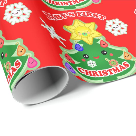 Baby's eerste kerstcadeautje met glanzende ompakke cadeaupapier (Rol Hoek)