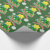 Baby's eerste kerstcadeautje met glanzende ompakke cadeaupapier (Hoek)