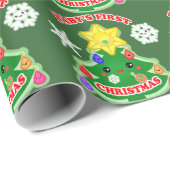 Baby's eerste kerstcadeautje met glanzende ompakke cadeaupapier (Rol Hoek)