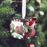 Baby's Eerste Kerstplein Foto's Decoratie<br><div class="desc">Vier de vreugde van Baby's Eerste Kerstmis met ons Photo Cube-Ornament. Dit charmante ornament beschikt over vijf vierkante fotosjablonen, waarmee u kostbare jaarherinneringen kunt koesteren. De top kan worden gepersonaliseerd met de naam van uw baby en het jaar, waardoor het een gekoesterde aandenken is. Tegen een feestelijke vakantie geruite achtergrond,...</div>