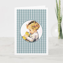 Baby's eerste Pasen.  Baby met eendje