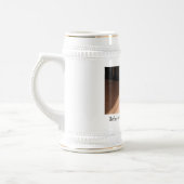 Baby's voet op papa's voet bierpul (Links)