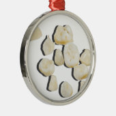 BabyTeeth033113.png Metalen Ornament (Rechts)