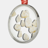 BabyTeeth033113.png Metalen Ornament (Links)