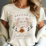 Bach Crew Western Bloemen Hoefijzer Bachelorette<br><div class="desc">Stap in stijl met onze prachtige "The Bach Crew" cowgirl floral hoefijzer western vrijgezellenfeest tri-blend shirt! Dit shirt, dat comfort en charme perfect combineert, is ontworpen voor de moderne bruid die haar unieke spirit viert. Ideaal voor een Westerne Bachelorette, om je liefde voor alle Westerne dingen te laten zien, voegt...</div>