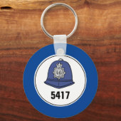 Badge Nummer. Helm Politieagent. Sleutelhanger (Voorkant)