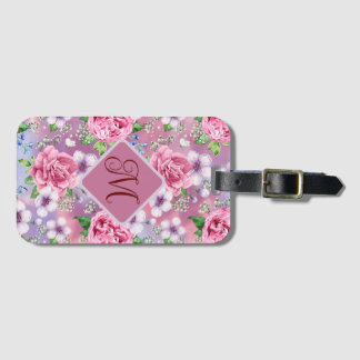 Bagagelabel met roze rozen en monogram