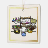 Baker bij zijn kerst-kerstversiering op bakkerij keramisch ornament (Links)
