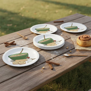 bakken van kaneelrollen papieren bordje