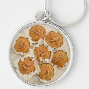 Bakvorm met gourmetmuffins in perkamentpapier sleutelhanger