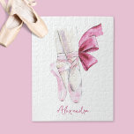 Ballet Slippers Custom Name or Text Legpuzzel<br><div class="desc">This beautiful puzzle features an elegant pair of pointe shoes, rendered in soft pastel hues of pink and white, capturing the grace and poise of ballet. The delicate ribbon ties and a vibrant pink bow add a charming touch. Below the illustration, a customizable name in an elegant script font allows...</div>