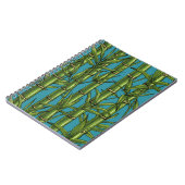 Bamboebos op blauw notitieboek (Linkerzijde)