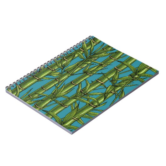 Bamboebos op blauw notitieboek (Linkerzijde)