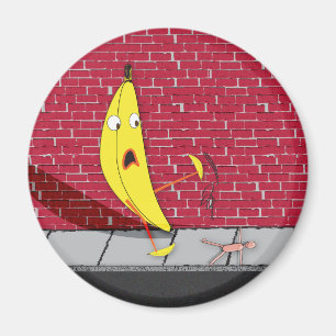 Banana die op een Person Magnet glijdt