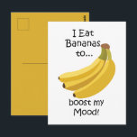 Banana Fruit Boost My Mood Funny Briefkaart<br><div class="desc">Banana Fruit Boost My Mood Funny Postcard originally designed by Nisha Prabhu. Spread joy and laughter with this delightful postcard featuring cheerful banana and tropical fruit illustrations! The humorous "Boost My Mood" message makes it perfect for sending a quick smile to friends and loved ones. Compact and charming, this postcard...</div>