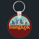 Bangkok Thailand  City Skyline Cityscape Sleutelhanger<br><div class="desc">en retro-stadsplan met prachtige skyline, toeristische attractie en cityscape art. Koelwolkenkrabber en bouwartikelen voor silhouette-illustratie voor toeristen en reizigers. Perfect als souvenir om terug naar huis te brengen wanneer je over de wereld reist. Bespaar de herinnering aan uw reis en vakantie met familie en vrienden. De achtergrondkleur kan aan uw...</div>