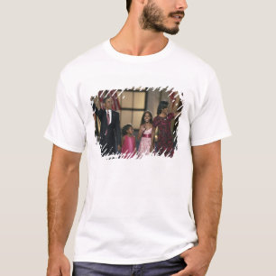 Barak Obama familie zwaait op de laatste avond van T-shirt
