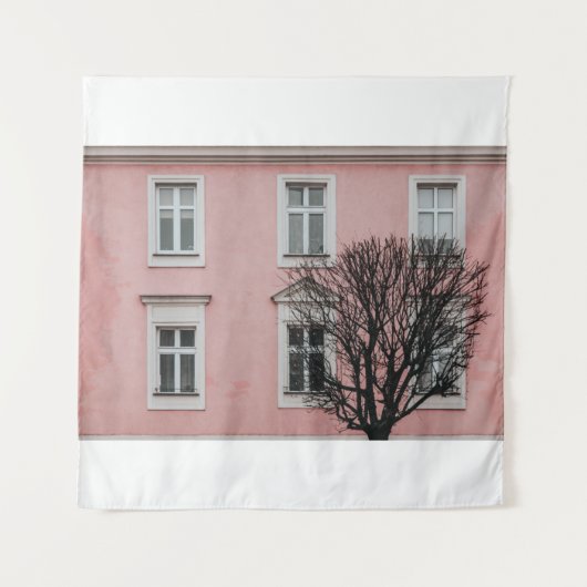 BARE TREE IN FRONT OF PINK BUILDING WANDKLEED (Voorkant)
