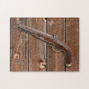 BARN BOARD MET PISTOOL LEGPUZZEL
