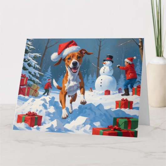 Basenji-hond speelt in de sneeuw winterscène kaart (Voorkant)