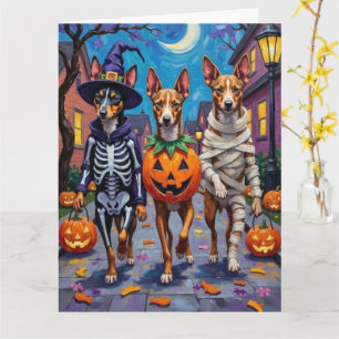 Basenji-honden gaan langs voor trick-or-treat met  kaart