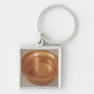 Basin, versierd met geometrische patronen sleutelhanger