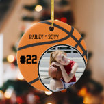 Basketbal Naam Jersey Nummer Foto Keepsake Keramisch Ornament<br><div class="desc">Dit ontwerp heeft een basketbal achtergrond met ruimte voor een naam, nummer en foto. Klik op de knop aanpassen voor meer flexibiliteit bij het aanpassen van de tekst! Variaties van dit ontwerp en coördinerende producten zijn beschikbaar in onze winkel, zazzle.com/store/doodlelulu. Neem contact met ons op als u dit ontwerp op...</div>
