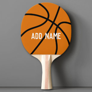 Basketbalcoach of leraar lichamelijke opvoeding tafeltennisbatje