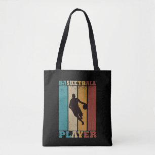 Basketballer dribbelen  retro stijl tote bag