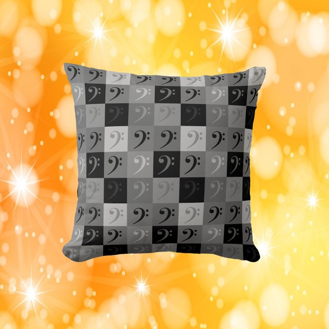 Bass Clef zwart en grijs Kussen (A throw pillow with a bass clef pattern in blacks and grays)