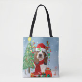 Basset Hound Dog in sneeuw met kerstcadeautjes Tote Bag (Voorkant)