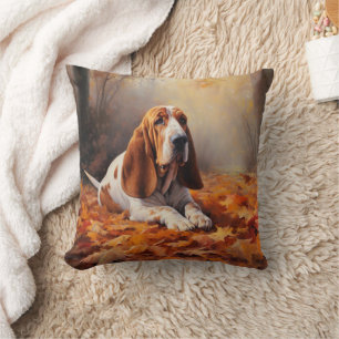 Basset Hound in herfstbladeren val inspireert Kussen