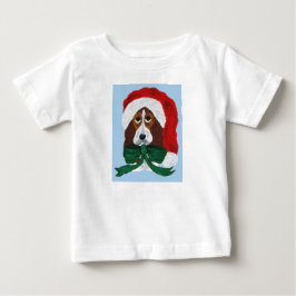 Basset Hound Pup in een Kerstmannenhoed